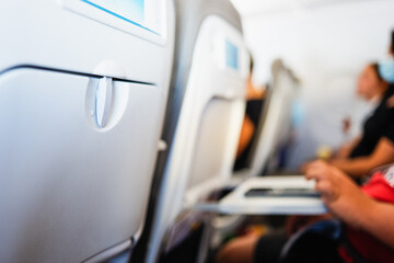 passengers seated on the plane