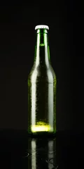 Foto op Canvas Image of green glass beer bottle with white crown cap, with copy space on black background © vectorfusionart