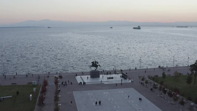Aerial - Distant shot of Alexander the Great statue in Thessaloniki at dawn