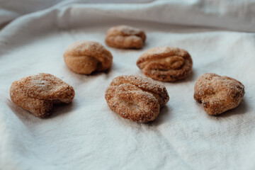 Bakery products. Homemade cookies with sugar on a towel background. Background image, copy space.