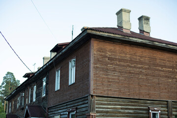 Old house made of boards. Emergency housing in Russia. Details of construction.