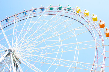 Ferris wheel - Amusement park on a sunny day