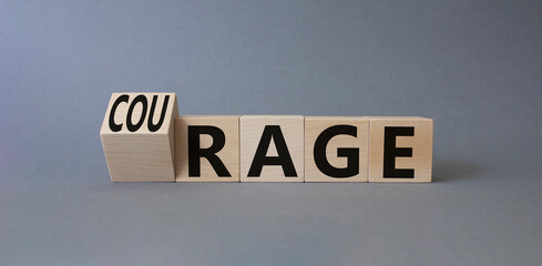 Courage and rage symbol. Turned wooden cubes with words Rage and Courage. Beautiful grey background. Business concept. Copy space.