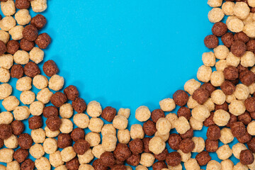 Corn sweet balls on a blue background with place for text. Quick breakfasts, top view