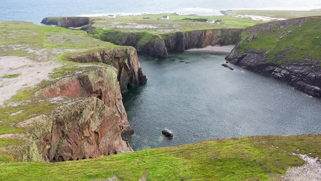 The cliffs and sea stacks at Port Challa on Tory Island, County Donegal, Ireland