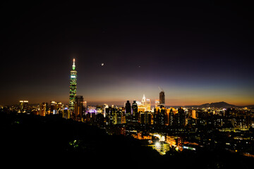Fototapeta na wymiar Night view of Taipei 101 building and other buildings. The night view of Taipei City, Taiwan.