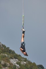 Bungee jumping young woman