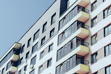 Apartment building with modern architecture in city downtown