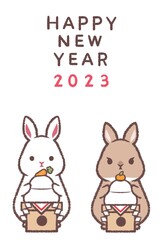 Obraz na płótnie Canvas シロウサギとネザーランドドワーフと鏡餅2023年賀状縦