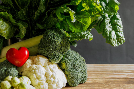 broccoli, colliflower leeks, spinach with a red heart