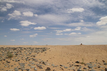 Empty dry steppes of Uzbekistan in cloudy weather
