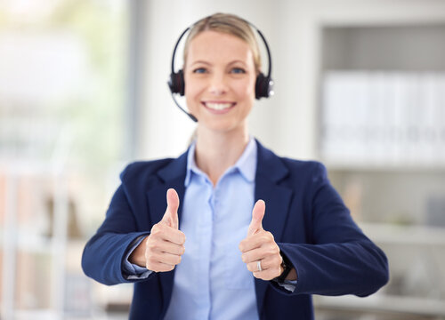 Sales woman, thumbs up success and telemarketing call center, happy customer service and yes review of agent in office. Portrait of smile crm consultant, winning business trading and consulting agree