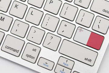 national flag of malta on the keyboard on a grey background .3d illustration - obrazy, fototapety, plakaty