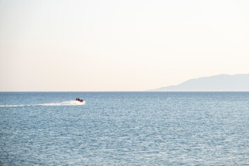 Obraz premium Sea Motor from a distance in calm sea. Selective Focus Vehicle