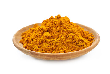 a pile of ground turmeric powder or curcumin powder in wood plate isolated on white background....