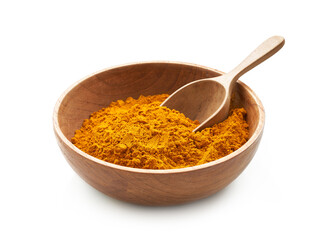 a pile of ground turmeric powder or curcumin powder in wood plate and scoop isolated on white background. turmeric or curcumin powder isolated