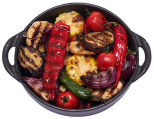 Grilled vegetables in black ceramic plate isolated