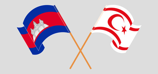 Crossed and waving flags of Cambodia and Northern Cyprus