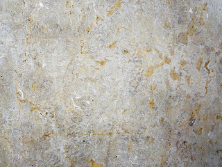 Stone effect texture with yellow marble effect veins. Texture concept for backgrounds.