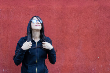 Women smiling and holding hair