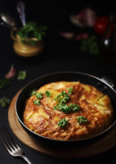 Traditional Spanish dish tortilla on the table	