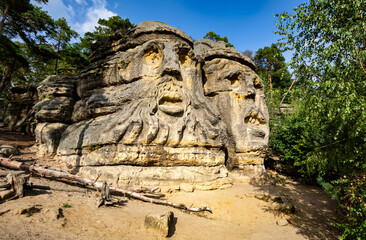 Devil's Head (Certovy Hlavy), two faces carved in sandstone rocks, Kokorin Forest, Village Zelizy, Czech Republic