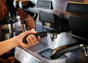 Close-up of banner size of barista working makeing coffee with coffee machine