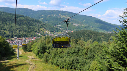 Mountain chairlift. 4-seater chairlift. The ski lift going to the station. Close up of an empty...