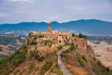 Ancient town of Bagnoregio, Italy. Old village on hill with a bridge