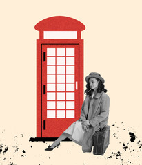 Contemporary art collage. Young stylish woman in coat and hat sitting on suitcase near red telephone box. Britain
