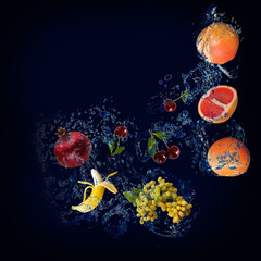 Wallpaper, panorama with fruits in the water - grapefruit, pomegranate, banana, grapes, cherries are very tasty and good for the body