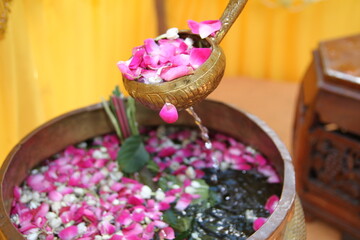 Betel leaves, rose petals and jasmine are always used for the traditional splash procession at wedding ceremonies by Indonesians