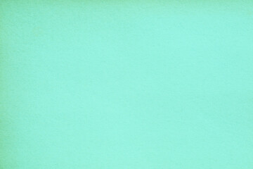 Old crumpled green paper background texture