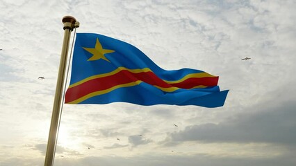 Flag of Democratic Republic waving in the wind, sky and sun background. Democratic Republic Flag Video. Realistic Animation, 4K UHD 25 FPS. 3D Animation 