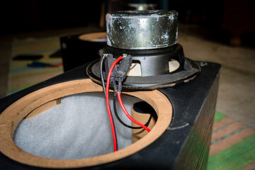 April 13th 2022, Dehradun City Uttarakhand India. A dismantled speaker with exposed wiring and sub...
