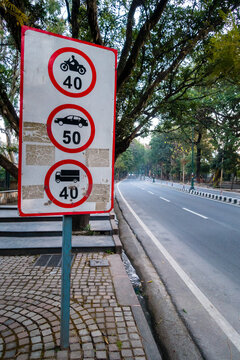 Maximum Speed Limit sign board for different kinds of vehicle on National Highway Rajpur road. Dehradun city of Uttarakhand, India.