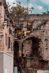 old abandoned building with a lot of garbage bags in Split, Croatia