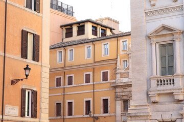 Fototapeta na wymiar Trevi Square Street View with Building Facades and Lantern in Rome, Italy