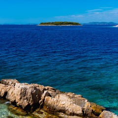 small island landscape with a rocky coast in Primosten, Croatia