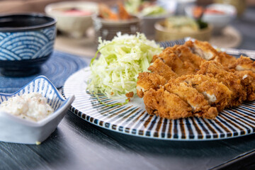 Pork cutlet and various Asian-style side dishes