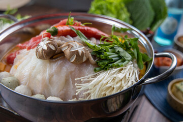 Asian traditional style shabu shabu, fresh vegetables and side dishes