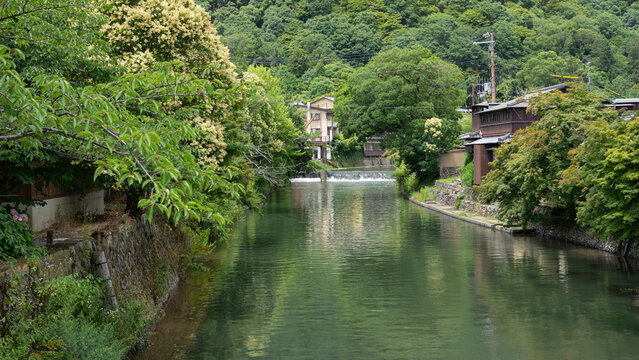 village under the mountain where the river flows
