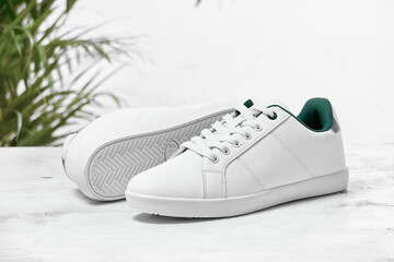white leather shoe Minimal conceptual idea sports shoes, leather footwear, travel idea and...
