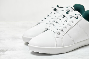 white leather shoe Minimal conceptual idea sports shoes, leather footwear, travel idea and...
