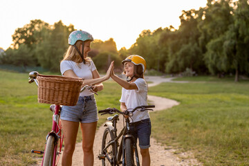 Mother and son enjoying a bike trip together
