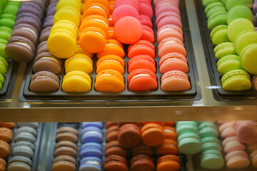 displaying colorful macaroon on shelf 