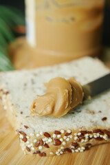  peanut butter and a bread on plate table 