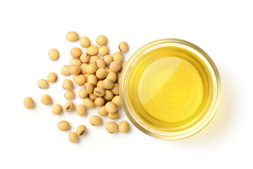 Top view of Soybean oil in glass bowl with seeds isolated on white background.