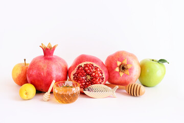 Rosh hashanah (jewish New Year holiday) concept. Traditional symbols over white background