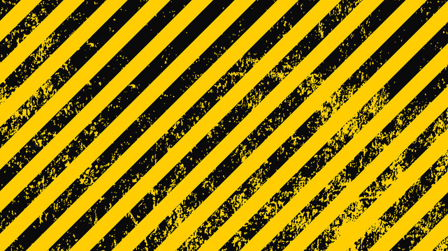 Grunge yellow and black diagonal stripes. Industrial warning background, warn caution, construction